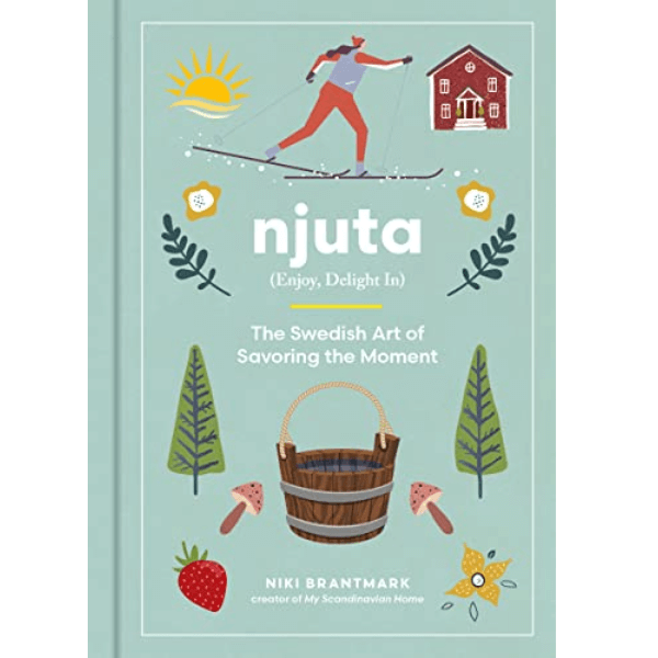 Książka „Njuta: Enjoy, Delight In: The Swedish Art of Savoring the Moment”. Okładka
